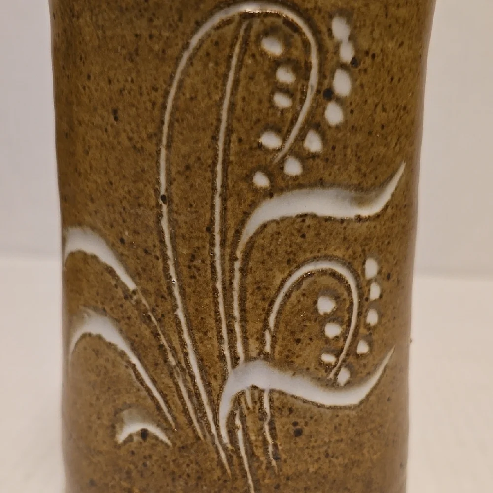 Brown Signed Pottery Vase with White Floral Design